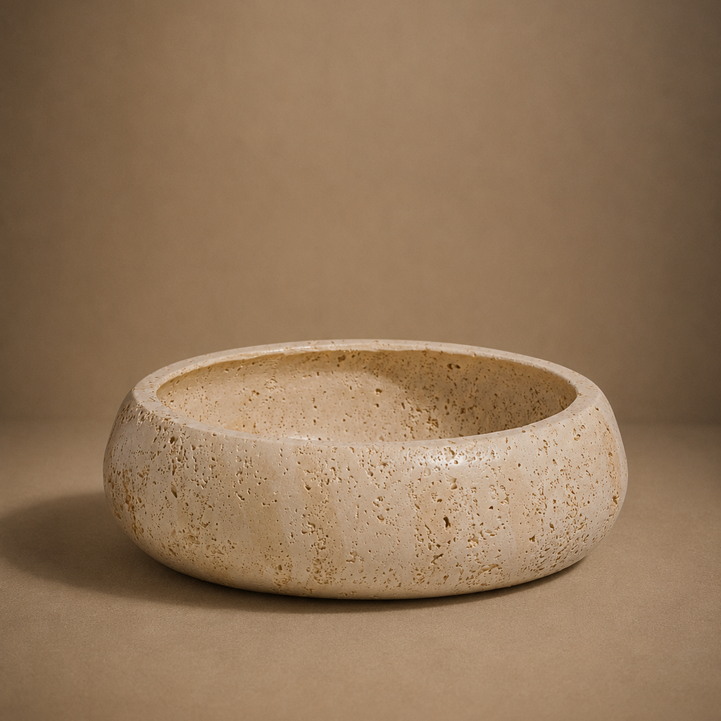 Ceramic bowl with speckled texture on a brown background