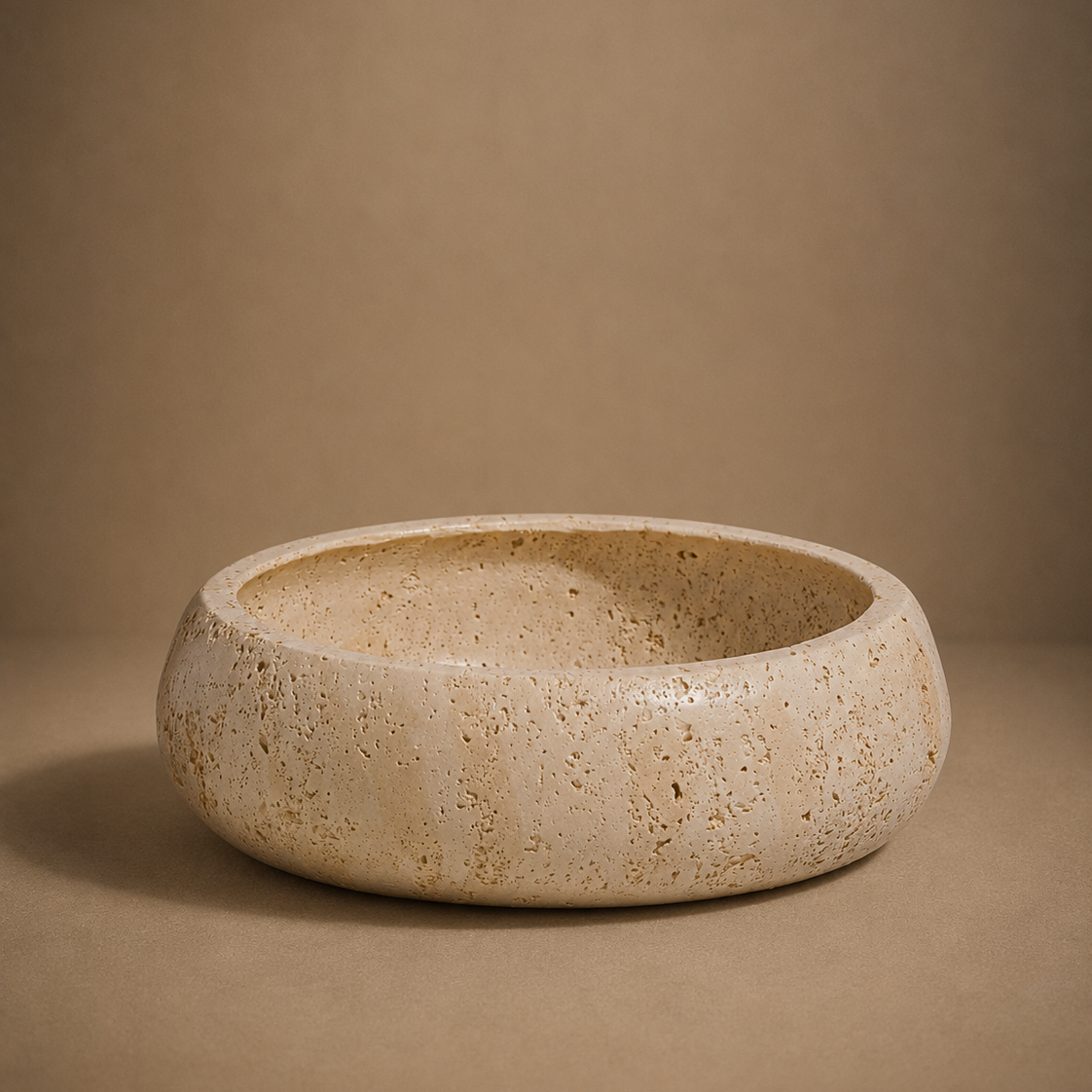 Ceramic bowl with speckled texture on a brown background